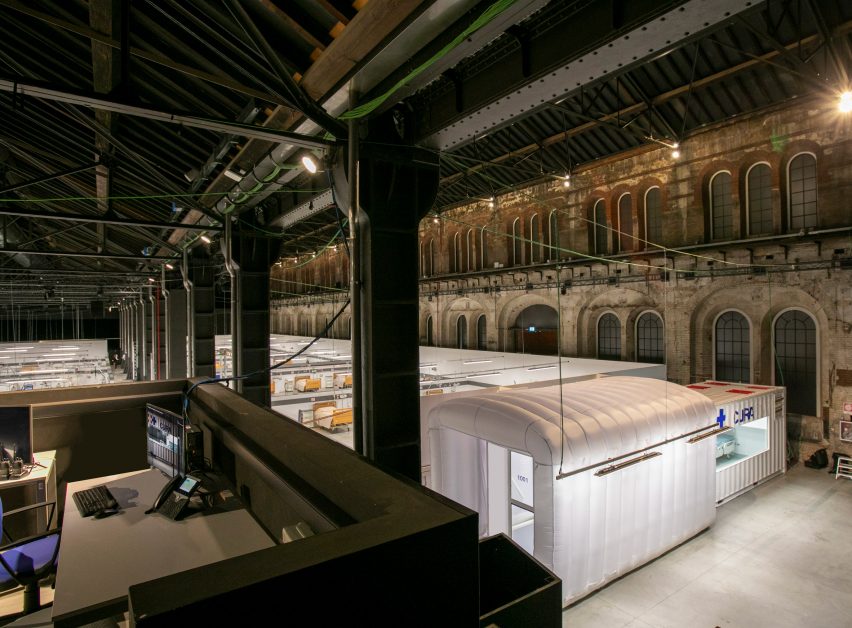 A two-bed intensive care unit within a shipping container, designed by Italian architects Carlo Ratti and Italo Rota, has been built at a hospital in Turin and is being used to treat patients fighting the coronavirus. Named Connected Units for Respiratory Ailments – or CURA, which is the latin word for cure – the intensive care pod was installed to increase intensive care unit (ICU) capacity in northern Italy. Designed by Ratti and Rota to treat two patients requiring intensive care, the unit has been installed at a temporary hospital built within the Officine Grandi Riparazioni complex in central Turin. The first patient was admitted earlier this week on 19 April.   Connected Units for Respiratory Ailments (CURA) intensive care  shipping-container pod by Carlo Ratti and Italo Rota   Built within a 6.1-metre-long shipping container, the intensive care pod contains two beds along with ventilators, monitors, intravenous fluid stands and syringe drivers. According to Ratti the pods combine the benefits of tents with permanent isolation wards as it has a ventilation system that generates negative pressure – a common technique used in hospitals to prevent contaminated air from escaping. The designers say the unit has been designed to comply with Airborne Infection Isolation Rooms (AIIRs) standards. "CURA strives to be as fast to be mounted as a hospital tent, but as safe as a regular isolation ward to work in, thanks to the comprehensive biocontainment equipment," said the designers.   The pod  It is extractor creates indoor negative pressure to comply with the standards of Airborne Infection Isolation Rooms. Two glass windows carved on the opposite sides of the containers are meant for doctors to always get a sense of the status of patients both inside and outside the pods. Also, this would potentially allow external visitors to get closer to their relatives in a safer and more humane setting.   "CURA aims to improve the efficiency of the existing design solutions of field hospitals, producing a compact ICU pod that is quick-to-deploy and safe to work in for medical professionals." The pod in Turin is the first CURA pod to be built, but further units are already under construction in other parts of the world including the UAE and Canada. CURA has been developed as an open-source project, with its tech specs, drawings and design materials made accessible for everyone online on https://curapods.org/open-source-files.   The pods are designed to work as single units, as the one in Turin is set up, or combined to create larger field hospitals.   Photography is by Max Tomasinelli. Project credits: Design and innovation: CRA-Carlo Ratti Associati with Italo Rota Medical engineering: Humanitas Research Hospital Medical consultancy: Policlinico di Milano Master planning, design, construction and logistics support services: Jacobs Research: MIT Senseable City Lab Visual identity & graphic design: Studio FM milano Digital media: Squint/Opera Safety and certifications: IEC Engineering Logistics: Alex Neame of Team Rubicon UK MEP engineering: Ivan Pavanello of Projema Medical consultancy: Maurizio Lanfranco of Ospedale Cottolengo Medical equipment supply: Philips Painting products: Gruppo Boero Support: World Economic Forum Covid-19 Action Platform, and Cities, Infrastructure and Urban Services Platform