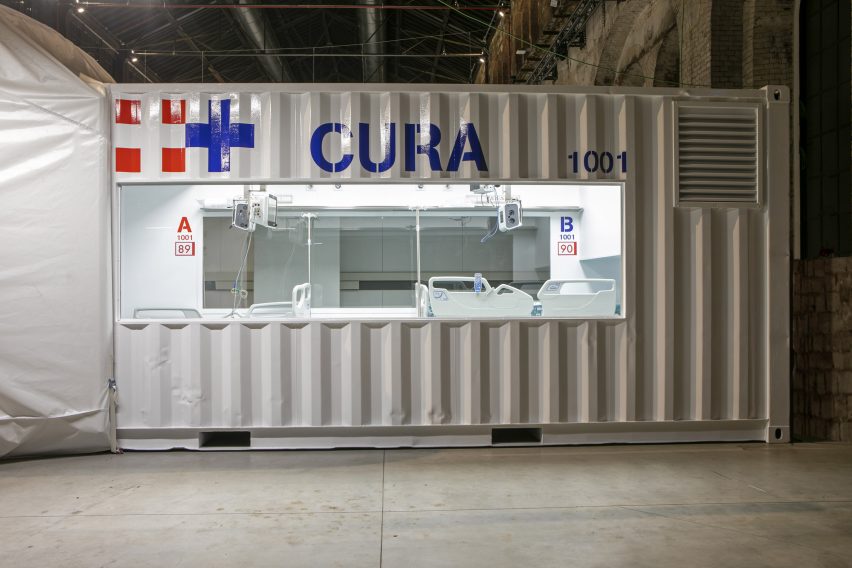 A two-bed intensive care unit within a shipping container, designed by Italian architects Carlo Ratti and Italo Rota, has been built at a hospital in Turin and is being used to treat patients fighting the coronavirus. Named Connected Units for Respiratory Ailments – or CURA, which is the latin word for cure – the intensive care pod was installed to increase intensive care unit (ICU) capacity in northern Italy. Designed by Ratti and Rota to treat two patients requiring intensive care, the unit has been installed at a temporary hospital built within the Officine Grandi Riparazioni complex in central Turin. The first patient was admitted earlier this week on 19 April.   Connected Units for Respiratory Ailments (CURA) intensive care  shipping-container pod by Carlo Ratti and Italo Rota   Built within a 6.1-metre-long shipping container, the intensive care pod contains two beds along with ventilators, monitors, intravenous fluid stands and syringe drivers. According to Ratti the pods combine the benefits of tents with permanent isolation wards as it has a ventilation system that generates negative pressure – a common technique used in hospitals to prevent contaminated air from escaping. The designers say the unit has been designed to comply with Airborne Infection Isolation Rooms (AIIRs) standards. "CURA strives to be as fast to be mounted as a hospital tent, but as safe as a regular isolation ward to work in, thanks to the comprehensive biocontainment equipment," said the designers.   The pod  It is extractor creates indoor negative pressure to comply with the standards of Airborne Infection Isolation Rooms. Two glass windows carved on the opposite sides of the containers are meant for doctors to always get a sense of the status of patients both inside and outside the pods. Also, this would potentially allow external visitors to get closer to their relatives in a safer and more humane setting.   "CURA aims to improve the efficiency of the existing design solutions of field hospitals, producing a compact ICU pod that is quick-to-deploy and safe to work in for medical professionals." The pod in Turin is the first CURA pod to be built, but further units are already under construction in other parts of the world including the UAE and Canada. CURA has been developed as an open-source project, with its tech specs, drawings and design materials made accessible for everyone online on https://curapods.org/open-source-files.   The pods are designed to work as single units, as the one in Turin is set up, or combined to create larger field hospitals.   Photography is by Max Tomasinelli. Project credits: Design and innovation: CRA-Carlo Ratti Associati with Italo Rota Medical engineering: Humanitas Research Hospital Medical consultancy: Policlinico di Milano Master planning, design, construction and logistics support services: Jacobs Research: MIT Senseable City Lab Visual identity & graphic design: Studio FM milano Digital media: Squint/Opera Safety and certifications: IEC Engineering Logistics: Alex Neame of Team Rubicon UK MEP engineering: Ivan Pavanello of Projema Medical consultancy: Maurizio Lanfranco of Ospedale Cottolengo Medical equipment supply: Philips Painting products: Gruppo Boero Support: World Economic Forum Covid-19 Action Platform, and Cities, Infrastructure and Urban Services Platform