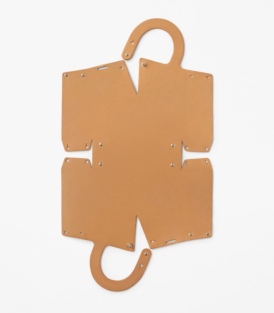 Nendo designs Mai bag from single sheet of laser-cut leather