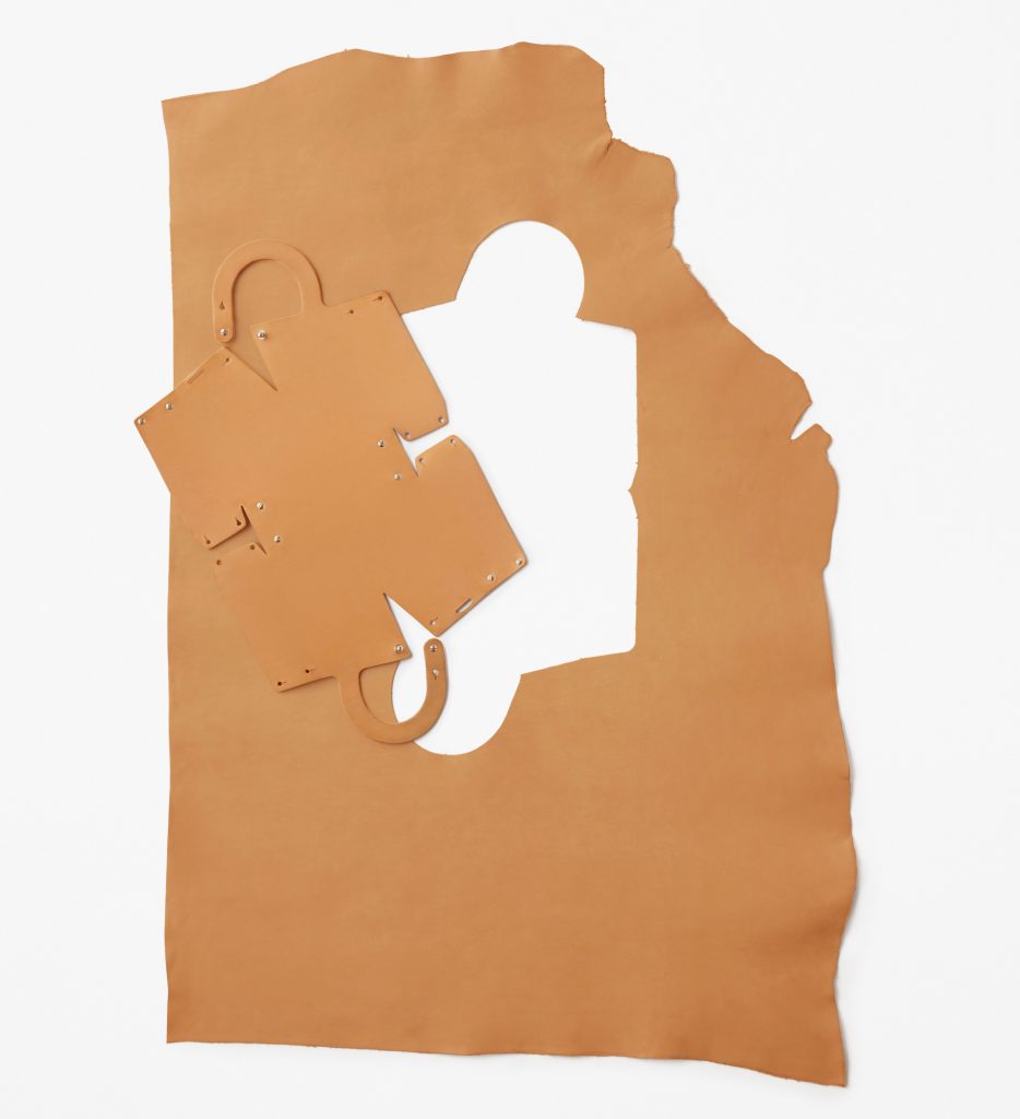 Nendo designs Mai bag from single sheet of laser-cut leather