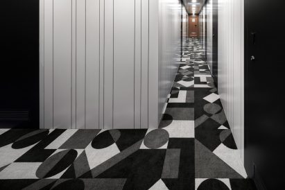 Nendo adorns Shofukumaru longliner boat with graphic patterns to recall life on land