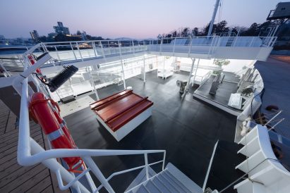 Nendo adorns Shofukumaru longliner boat with graphic patterns to recall life on land