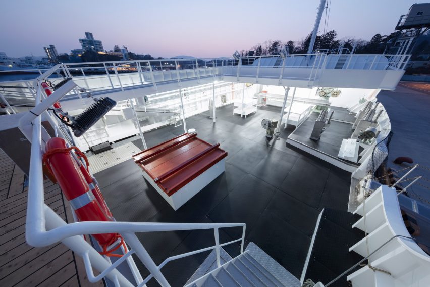 Nendo adorns Shofukumaru longliner boat with graphic patterns to recall life on land