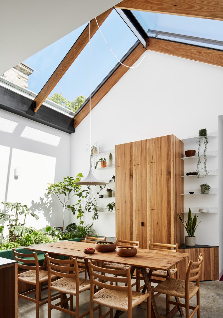 Greenhouse-like dining space in Newry house by Austin Maynard Architects