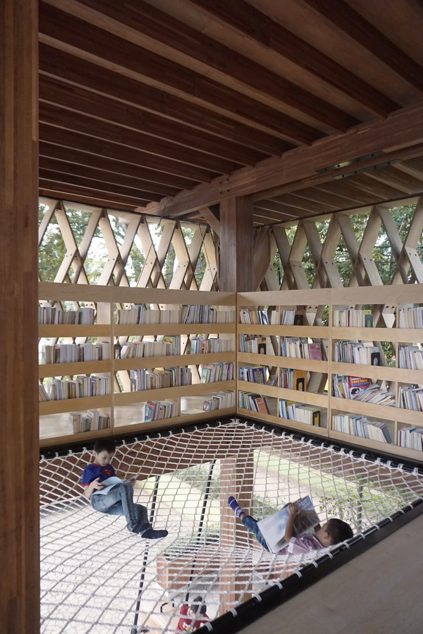 Microlibrary Warak Kayu by Shau hammock-style net floor