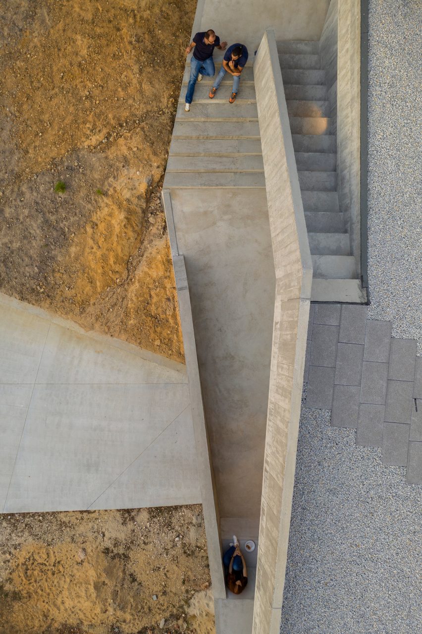 Contaminar Arquitectos designs Casa Povo to be an "inhabited and humanised cave"