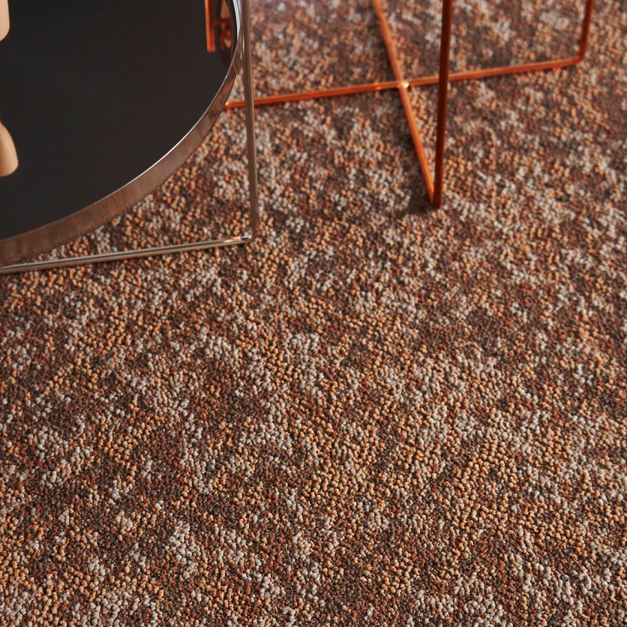 Forbo's Tessera Earthscape carpet tile collection features a dappled effect inspired by nature