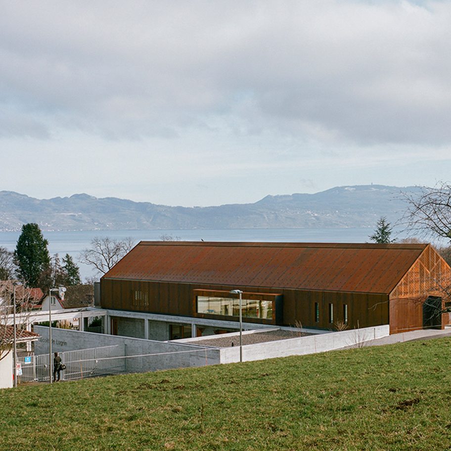 Corten and concrete school overlooks Lake Geneva