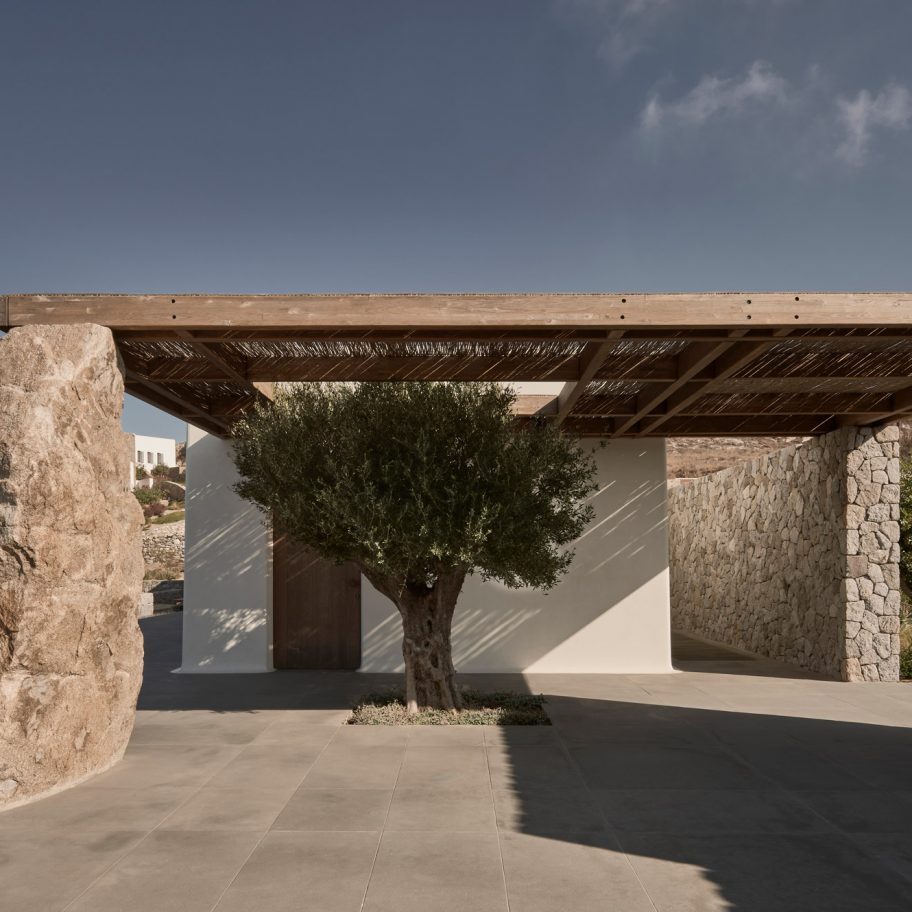 K-studio creates stone holiday home on Mykonos overlooking the Aegean Sea