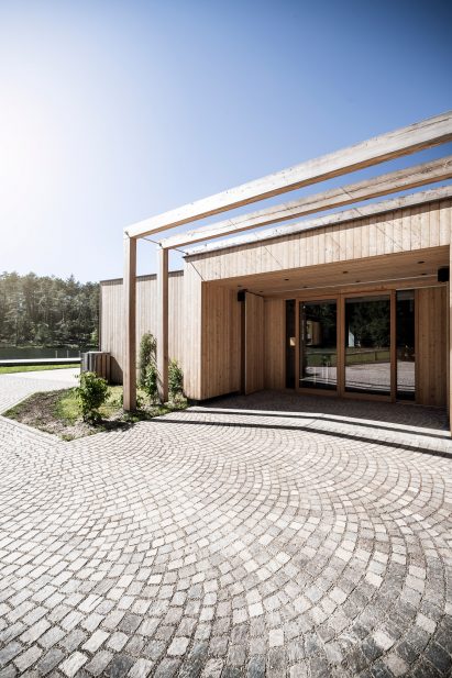 Cafe and changing room alongside Völser Weiher Lake in South Tyrol by Network of Architecture