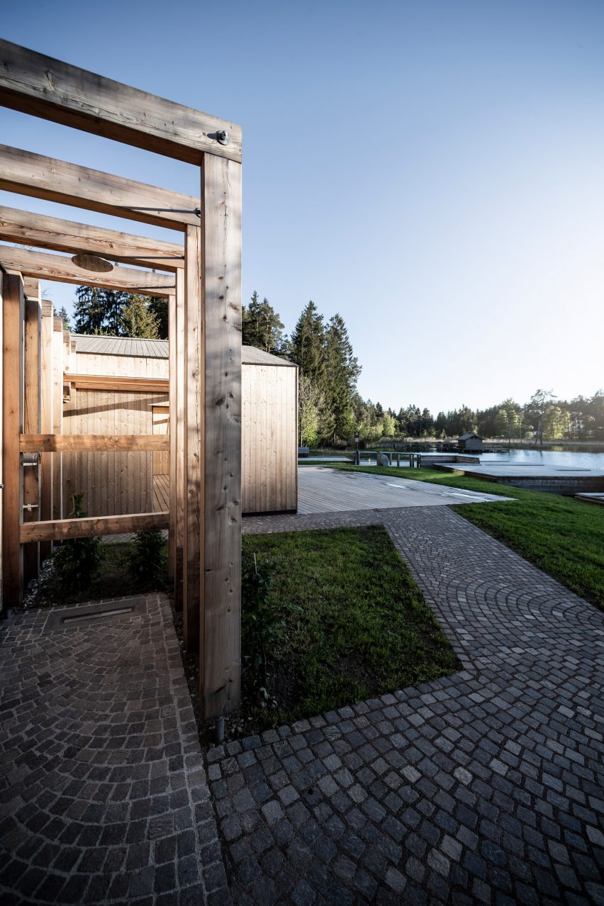 Cafe and changing room alongside Völser Weiher Lake in South Tyrol by Network of Architecture