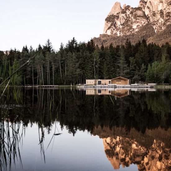 Cafe and changing room alongside Völser Weiher Lake in South Tyrol by Network of Architecture