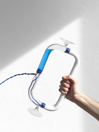 Tubular Circuiti Liquidi lamp uses blue liquid to activate light