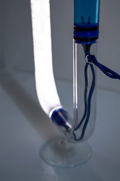 Tubular Circuiti Liquidi lamp uses blue liquid to activate light