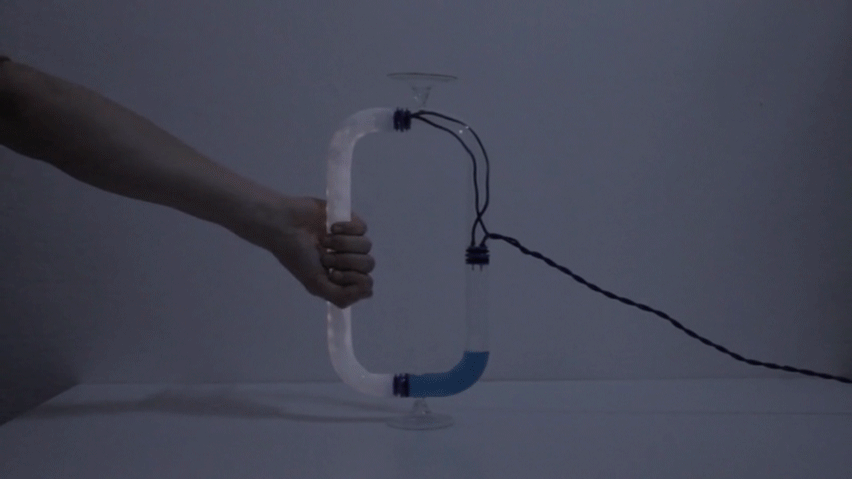 Tubular Circuiti Liquidi lamp uses blue liquid to activate light