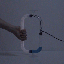 Tubular Circuiti Liquidi lamp uses blue liquid to turn on light