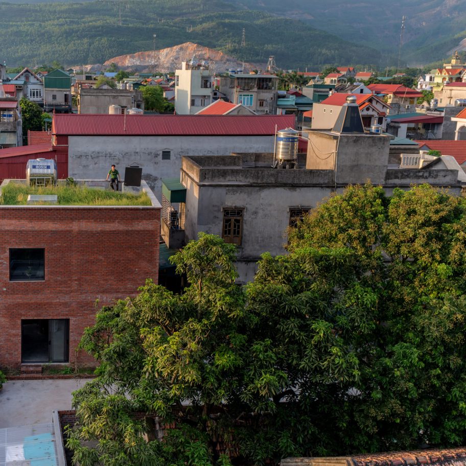H&P Architects tops Vietnam house with plantable roof to create “cube of earth”
