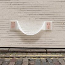 Thomas Gossner's wall-mounted Flair chair takes cues from plastic lunchboxes