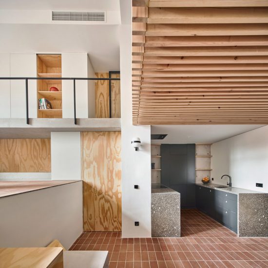 Mas-aqui uses multiple levels to open up Yurikago House in Barcelona