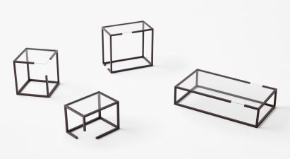 Nendo designs space helmet-shaped vessels and cascading tables for Zens
