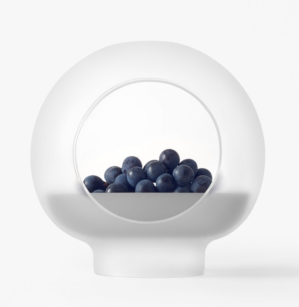 Nendo designs space helmet-shaped vessels and cascading tables for Zens