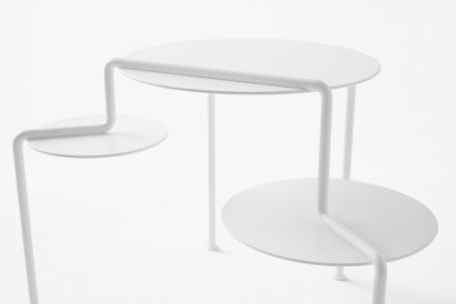 Nendo designs space helmet-shaped vessels and cascading tables for Zens