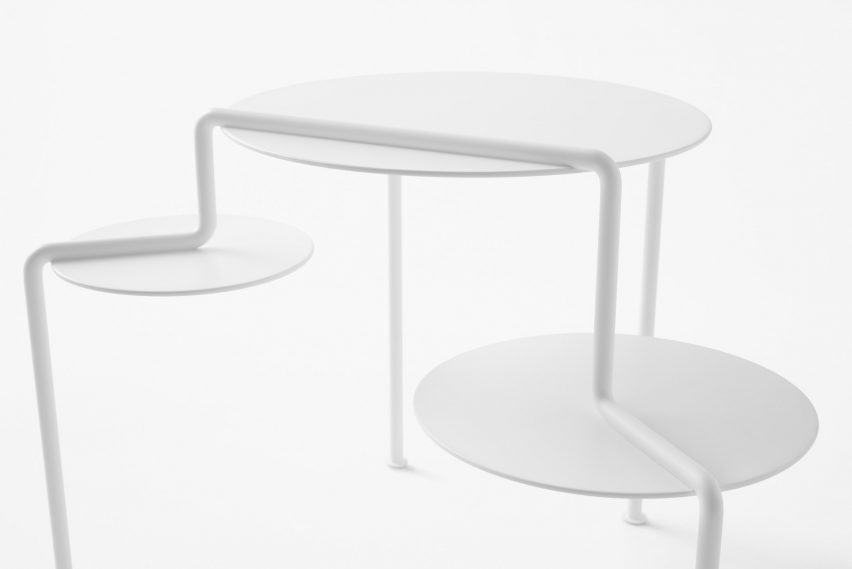 Nendo designs space helmet-shaped vessels and cascading tables for Zens