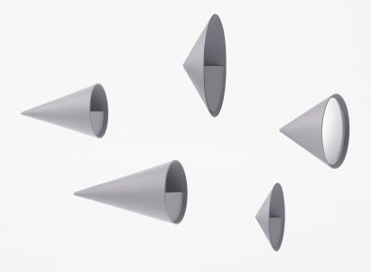 Nendo designs space helmet-shaped vessels and cascading tables for Zens