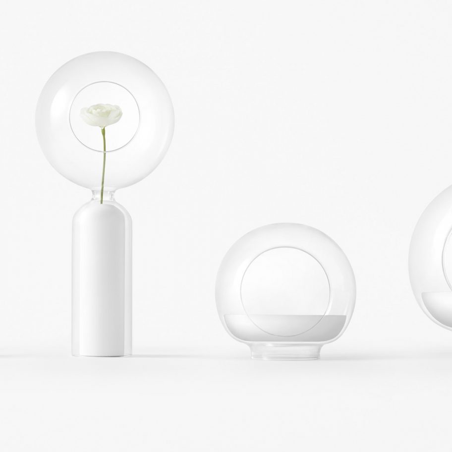 Nendo designs space helmet-shaped vessels and cascading tables for Zens