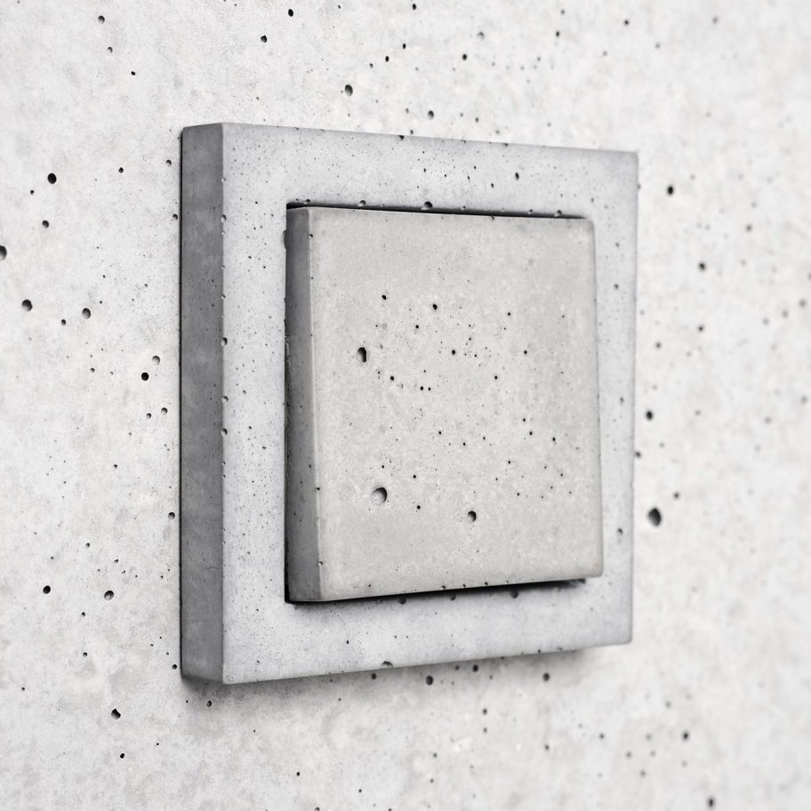 Sekhina designs minimal light switches and sockets from concrete