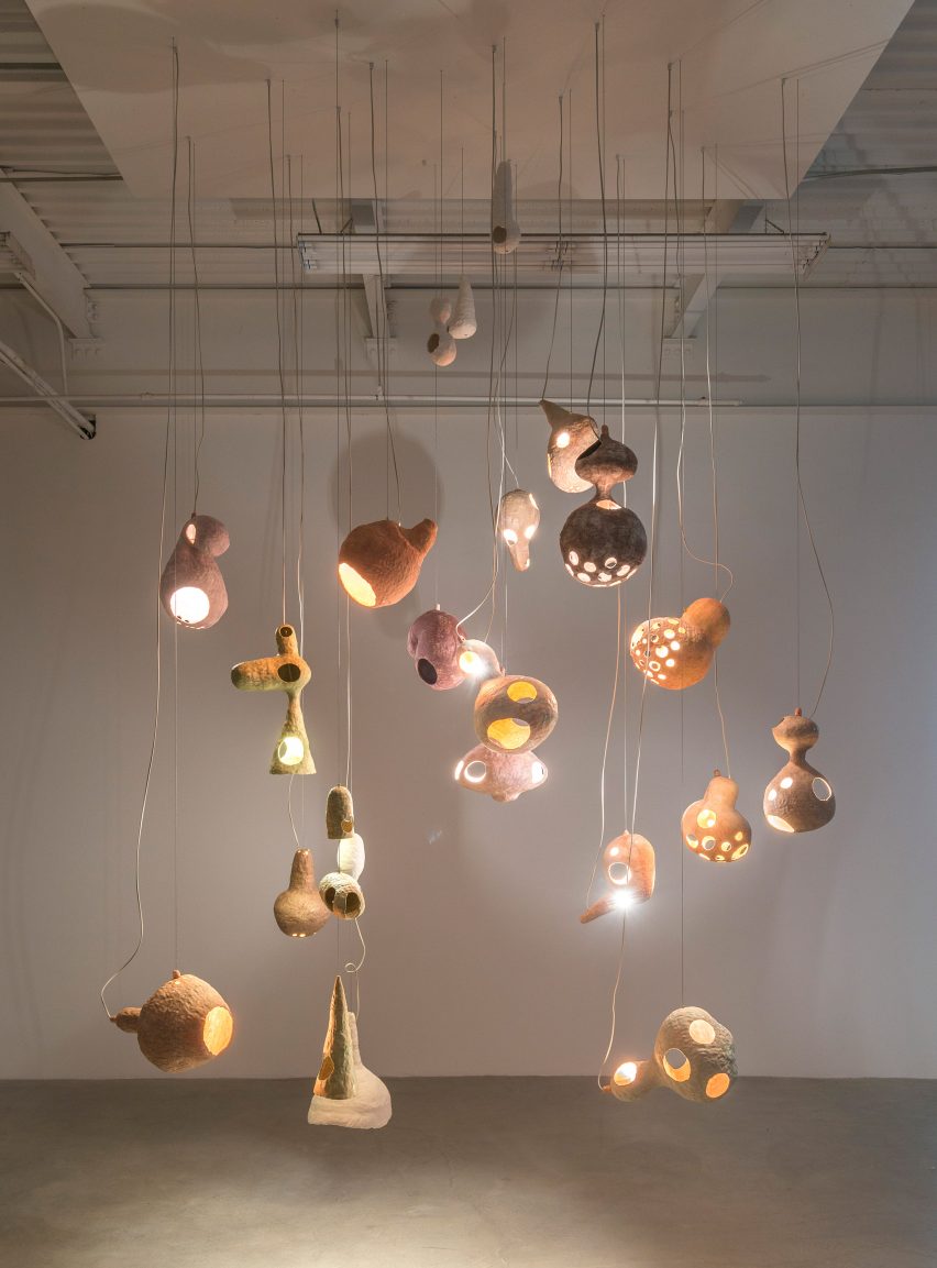 Yuko Nishikawa forms "floating" amorphous lights from shells of clay and paper