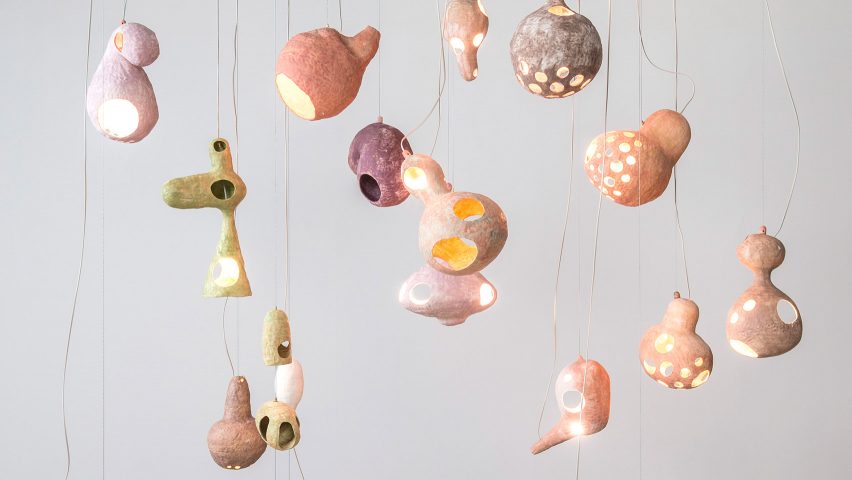 Yuko Nishikawa forms "floating" amorphous lights from shells of clay and paper
