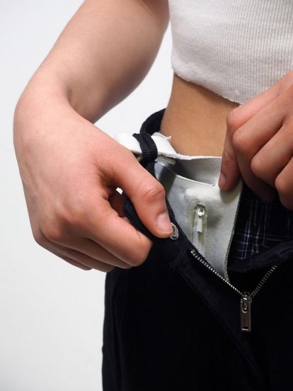 Carrie is a "wearable pocket" for police and army to store period products