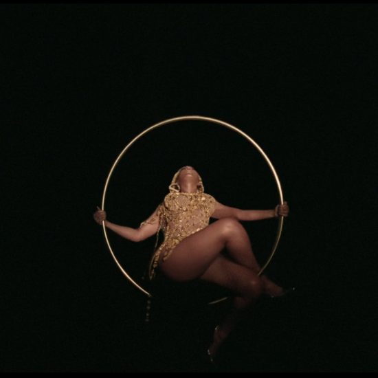 Beyoncé swings from Lee Broom’s Hanging Hoop Chair in Black is King visual album