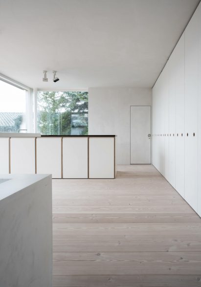 White kitchen with floor-to-ceiling cabinets