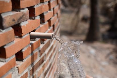 Orient Occident Atelier builds community hall in Cambodia that harvests clean drinking water