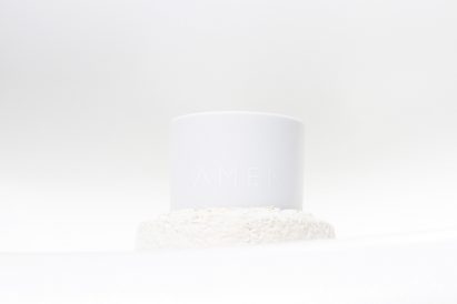 Amen candles are shipped in "carbon negative" mycelium packaging