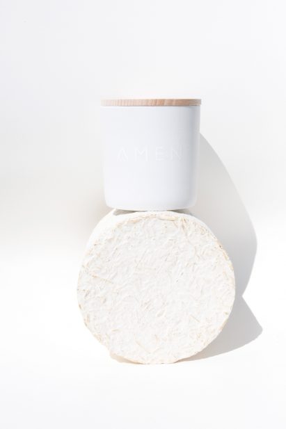 Amen candles are shipped in "carbon negative" mycelium packaging
