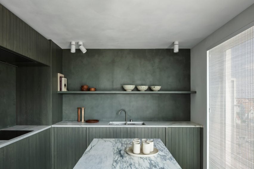 Apartment in Belgium features green kitchen