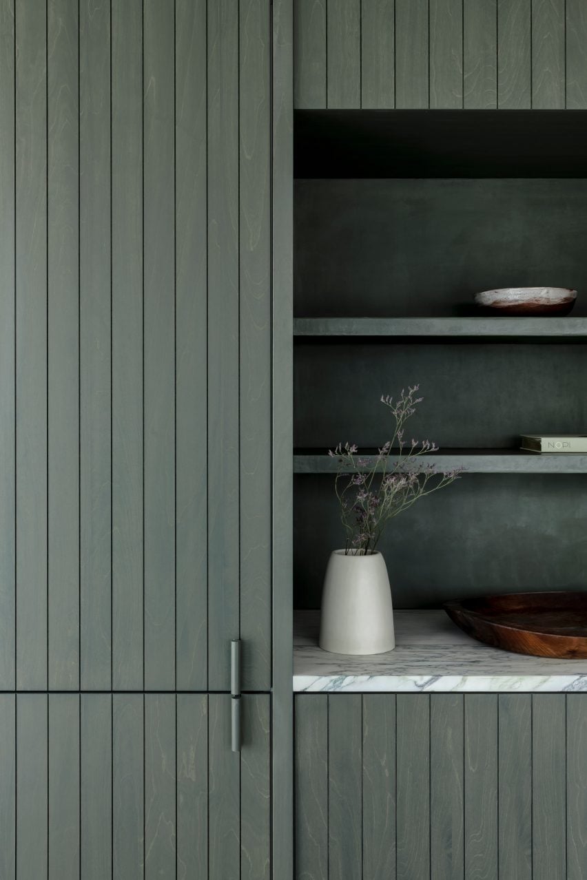 Apartment in Belgium features green kitchen