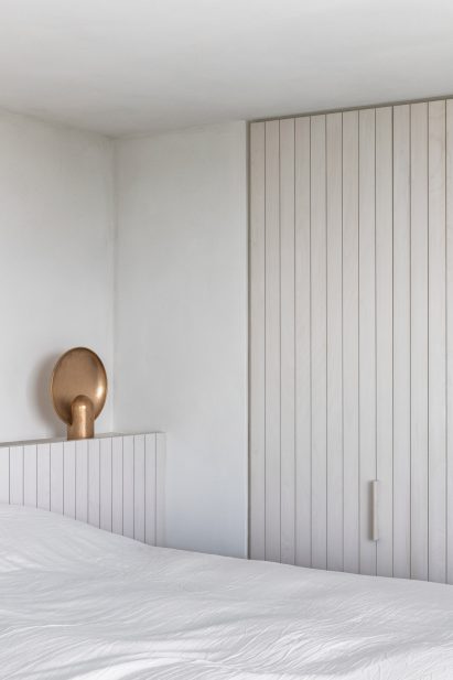 Belgium apartment includes white bedroom
