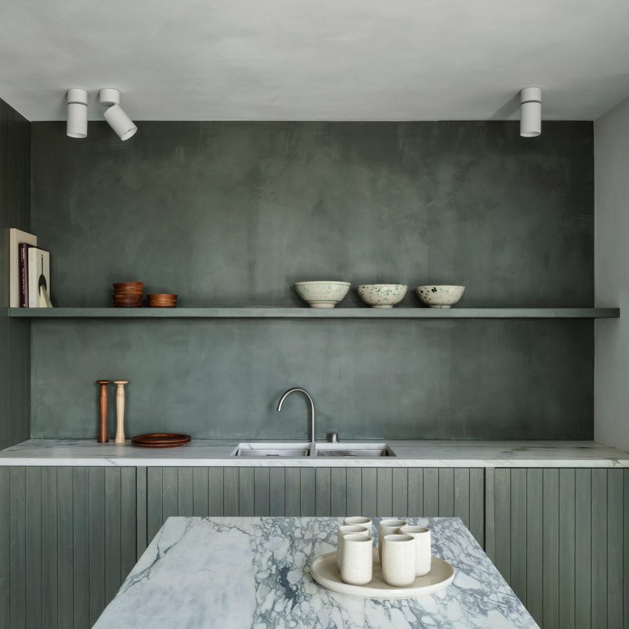Apartment in Belgium features green kitchen