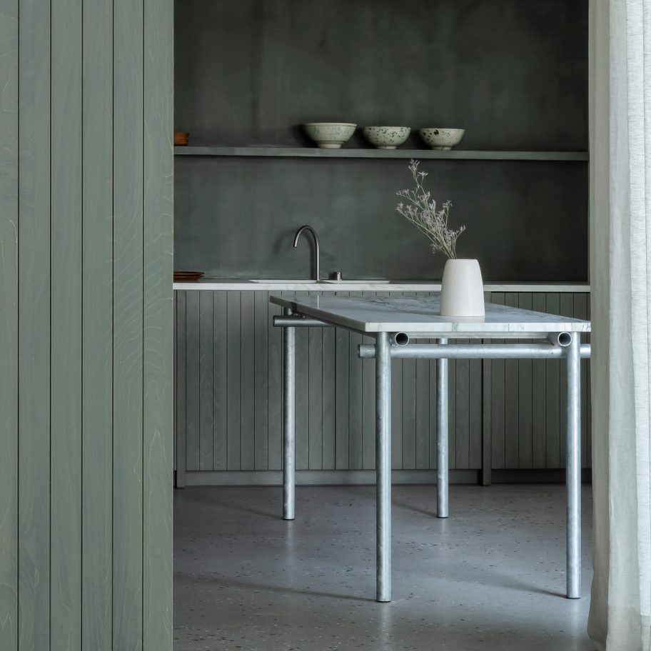 Apartment in Belgium features green kitchen