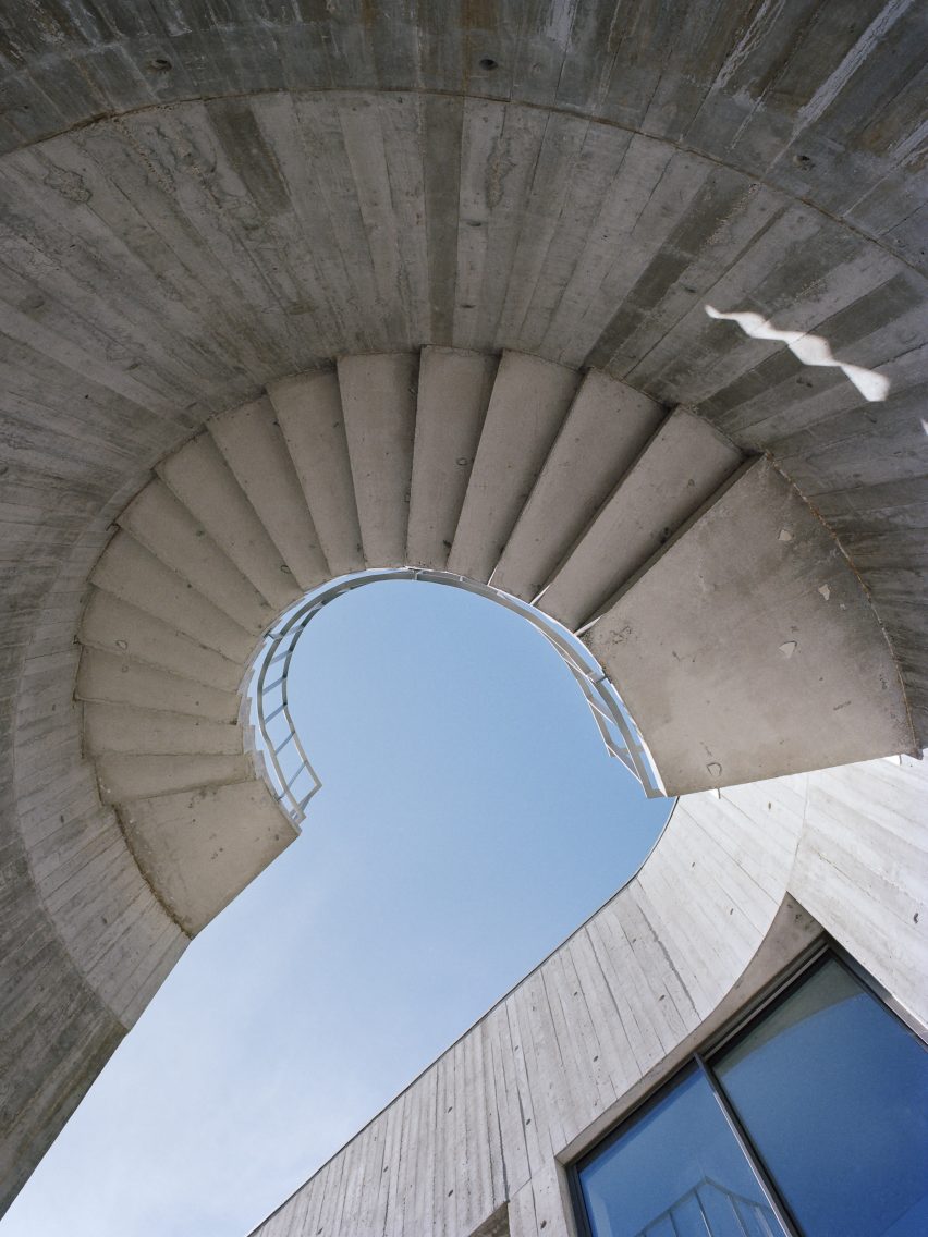 Concrete staircase of Trefoil House by Double O Studio