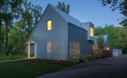 Exterior and perforated metal facade Music Box by CCY Architects