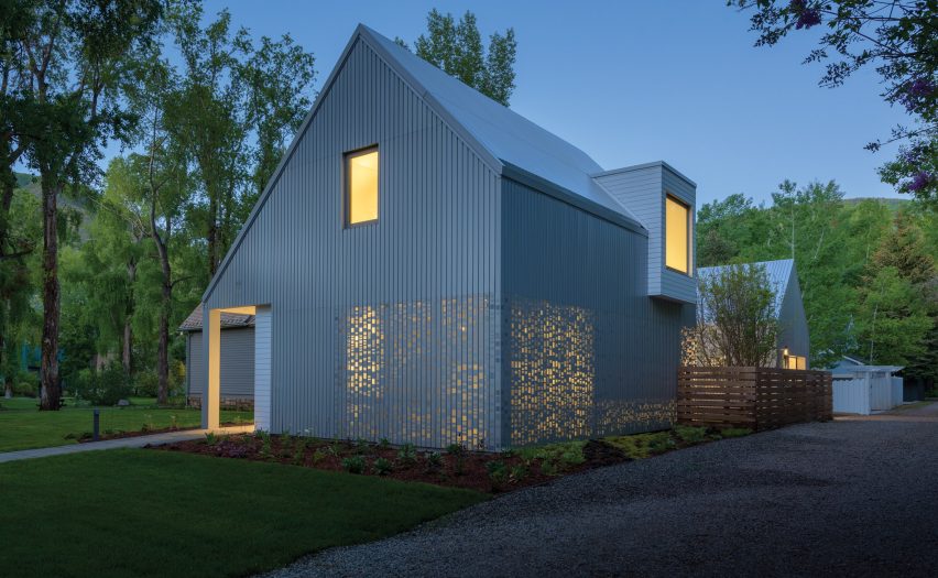 Exterior and perforated metal facade Music Box by CCY Architects