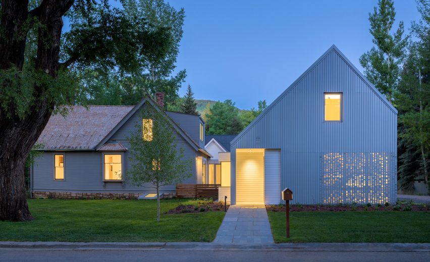 Exterior and perforated metal facade Music Box by CCY Architects