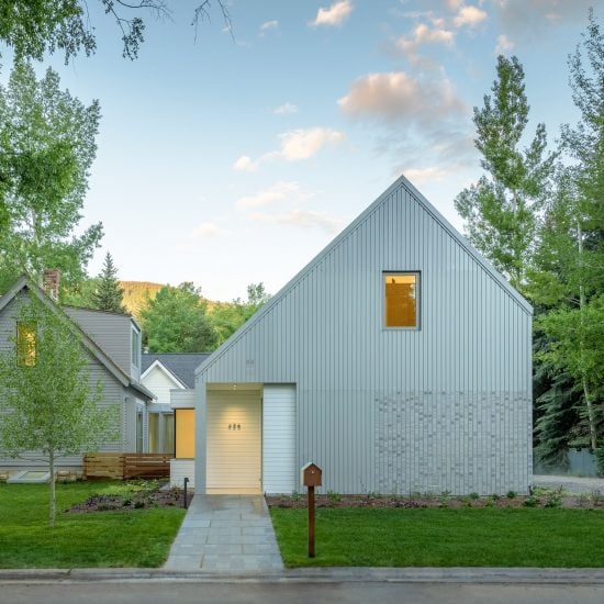 Exterior and perforated metal facade Music Box by CCY Architects