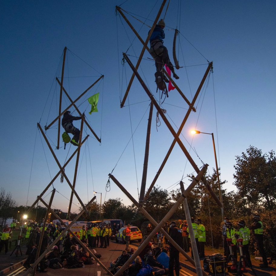 Extinction Rebellion create tensegrity structures to block printing presses