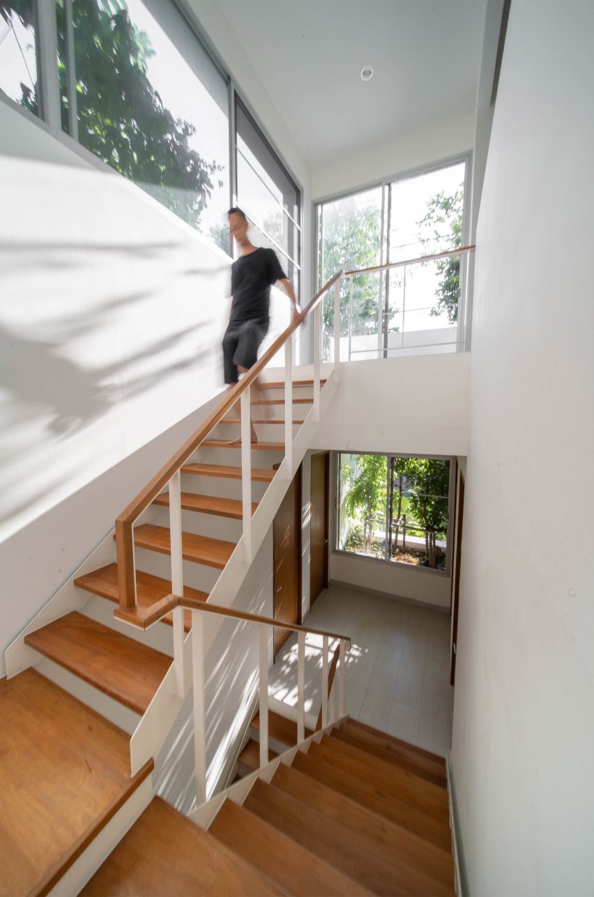 Wooden stairway of the Forest House by Shma Company